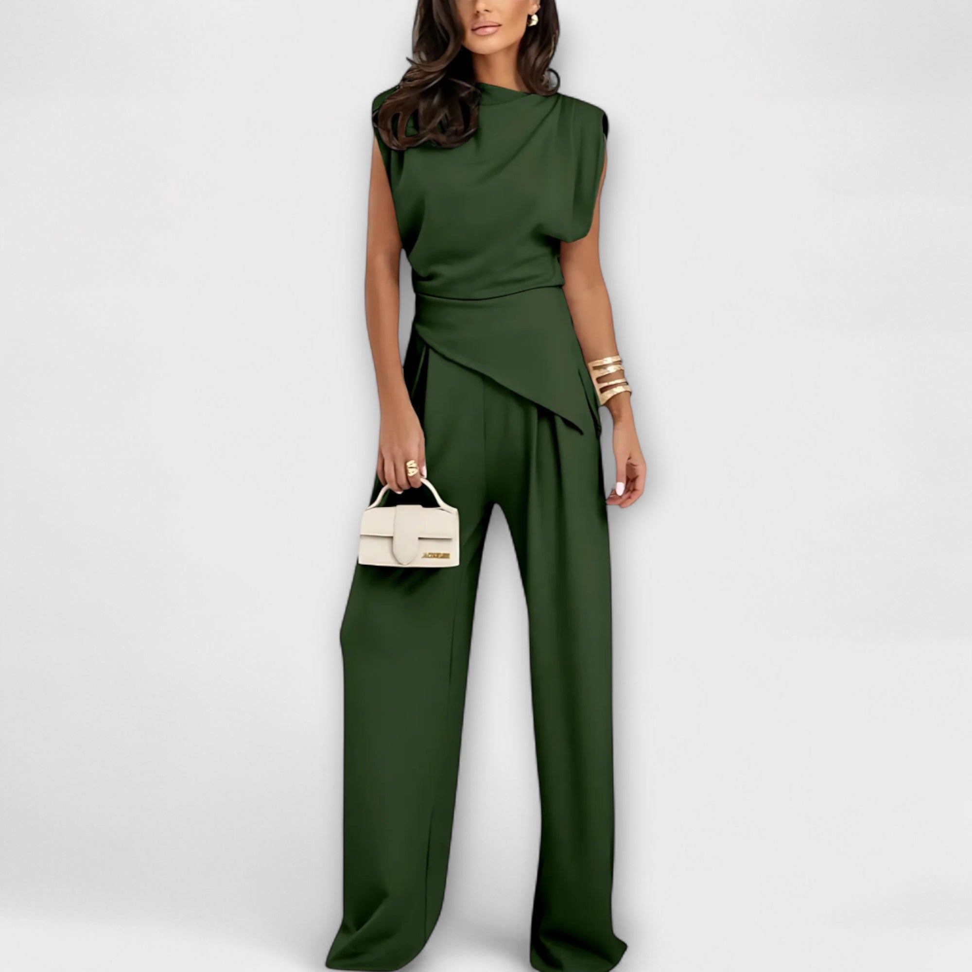 Set with asymmetric design and dramatic shoulders