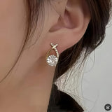 Earrings with a Gold Cross and Zirconia