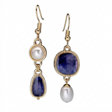 Elegant earrings with a blue stone and pearl